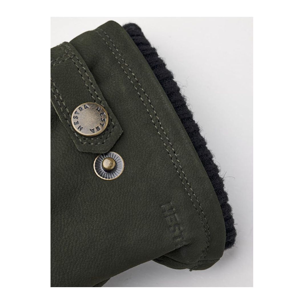 Men's Bergvik Hestra glove in bottle green, featuring durable leather and warm lining for cold weather.