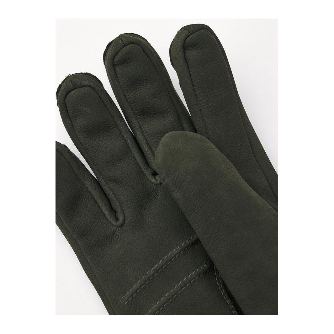 Men's Bergvik Glove in bottle green by Hestra, showing the stylish, insulated leather glove with detailed stitching and branding.
