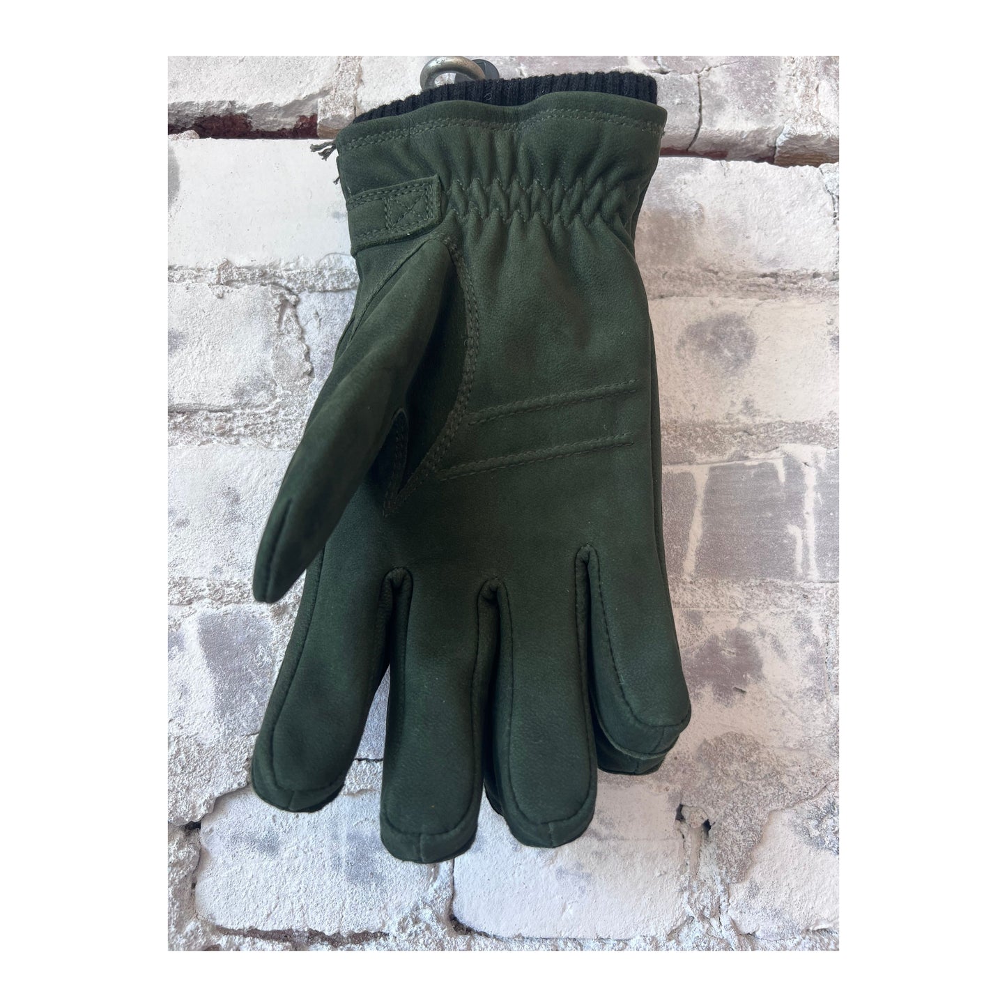 Men's Bergvik Hestra glove in bottle green, showcasing the stylish and warm winter glove with soft leather and textured details.