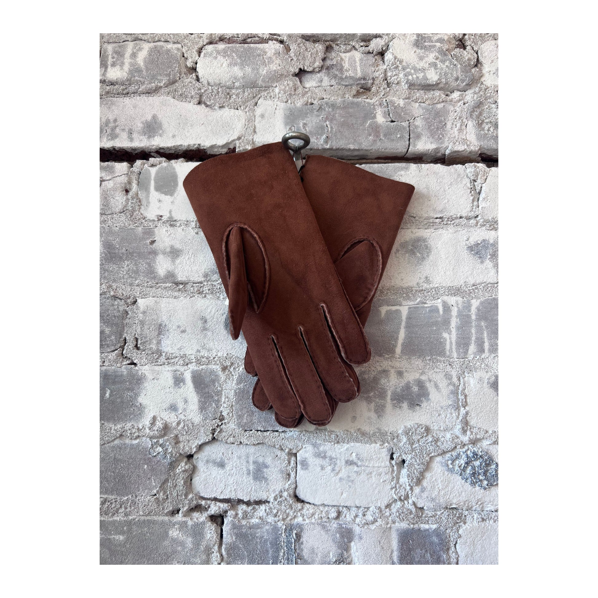 Hestra Bernard men's brown leather glove with stitching details, designed for warmth and style.
