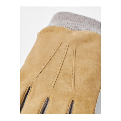 Men's Hestra Geoffrey Camel Glove showing soft leather exterior and detailed stitching on a neutral background.