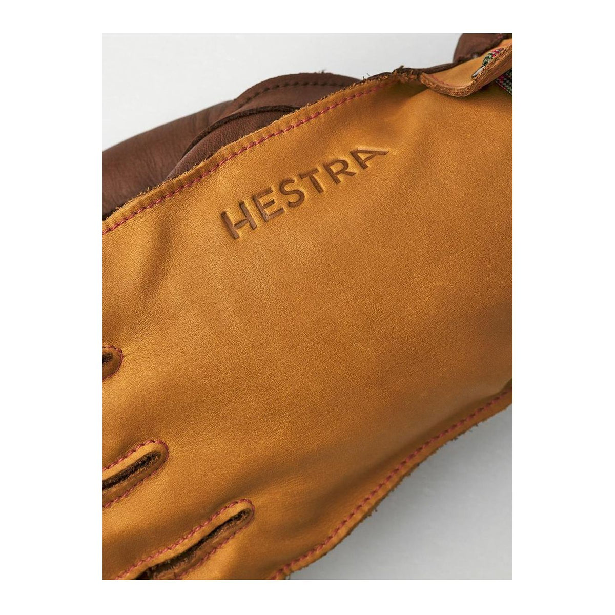 Men's Hestra Wakayama 5-Finger Glove in cork and brown leather, showing the detailed finger design and durable stitching.