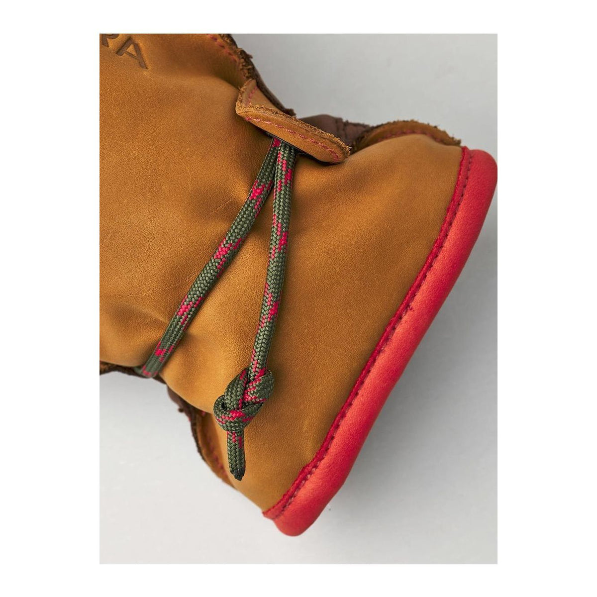 Men's Hestra Wakayama 5-Finger Glove in cork and brown leather, showing detailed stitching and flexible finger design.