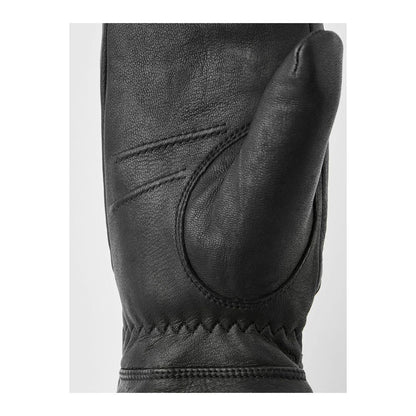 Black Hestra Boda Mitt for women, showcasing the insulated winter glove with a sleek design and durable exterior.
