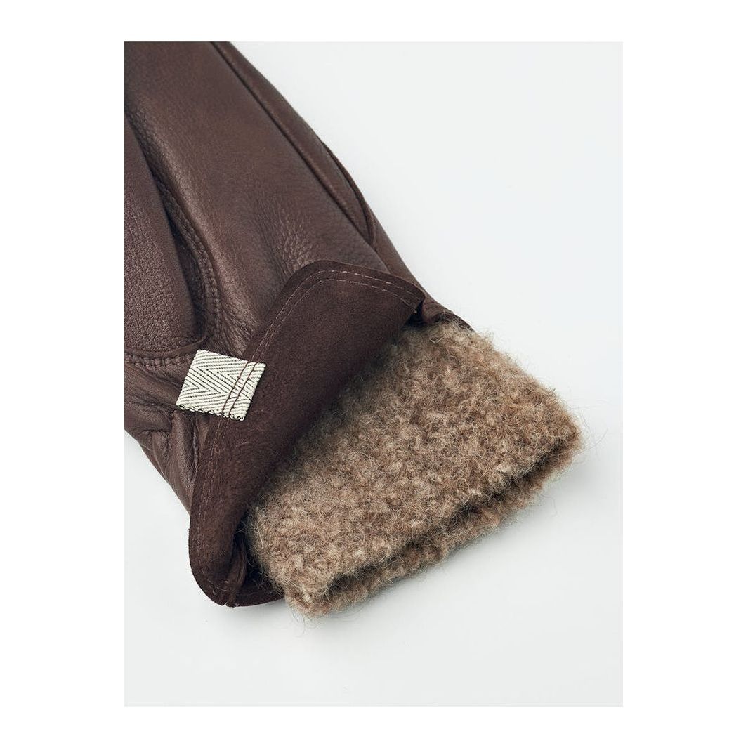 Hestra Tiril Mitt in chocolate for women, showcasing cozy insulated winter gloves with soft leather exterior.