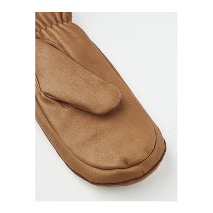 Women's Hestra Tiril Mitt made of cork with soft lining, designed for warmth and comfort during cold weather.