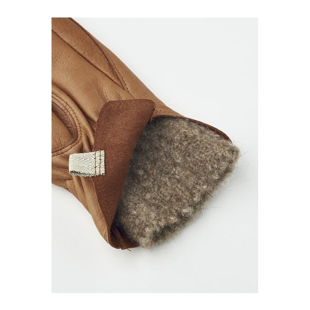 Women's Hestra Tiril Mitt made of cork, featuring a cozy lining and durable exterior for cold weather protection.
