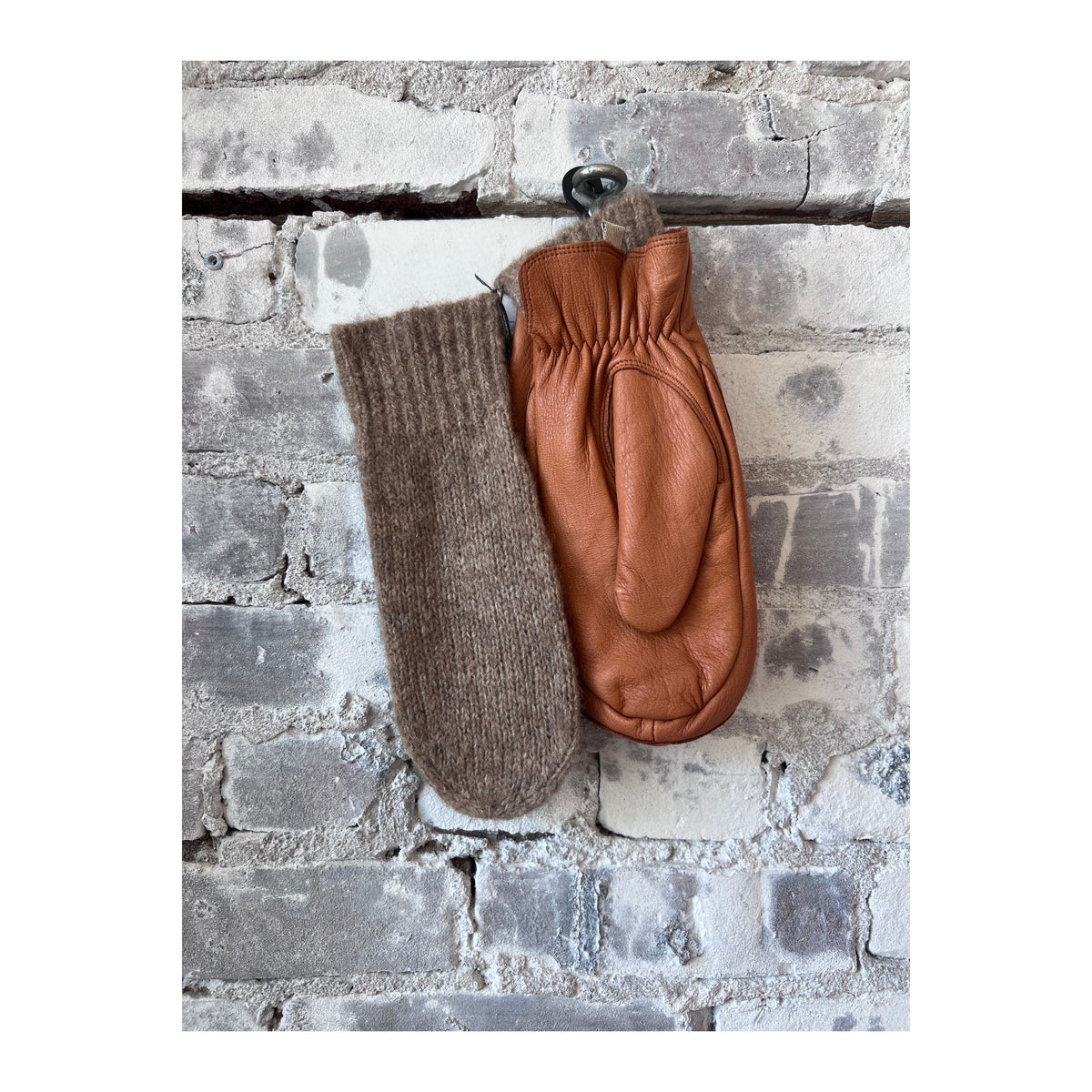 Women's Hestra Tiril Mitt made of cork, showcasing a close-up view of the stylish, insulated winter glove with a textured exterior.