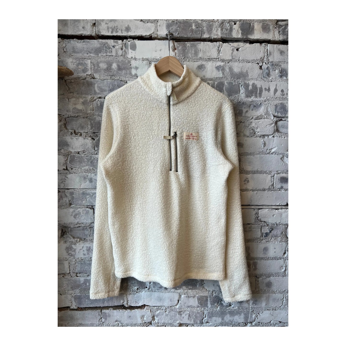 Men's Amundsen Hut Half Zip in oatmeal, showcasing the soft fabric and relaxed fit of this casual, comfortable men's top.