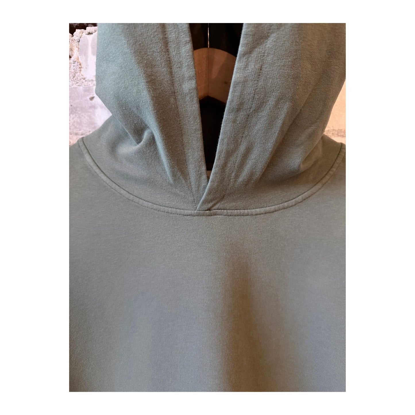 Men's IF Hood in Sea Kelp color by 04651, featuring a soft fabric hood with a relaxed fit and subtle branding detail.