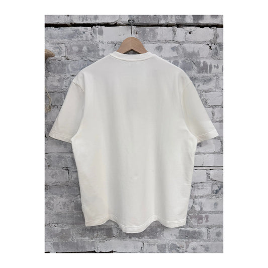 Men's ivory IF Tee by 04651, featuring a classic crew neck and soft cotton fabric, displayed on a hanger.