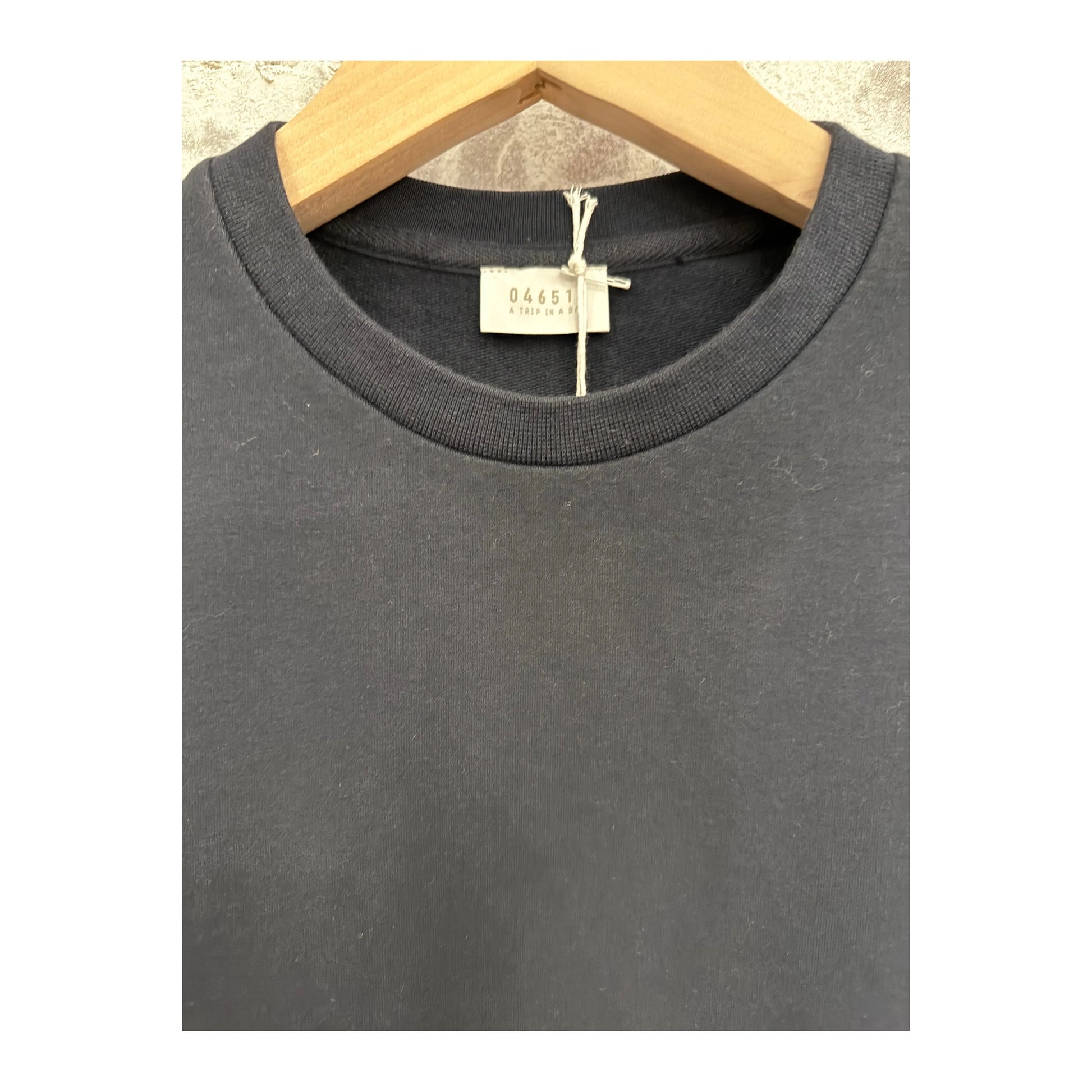 Men's navy IF Tee from 04651/ with a classic crewneck design, displayed on a hanger against a white background.