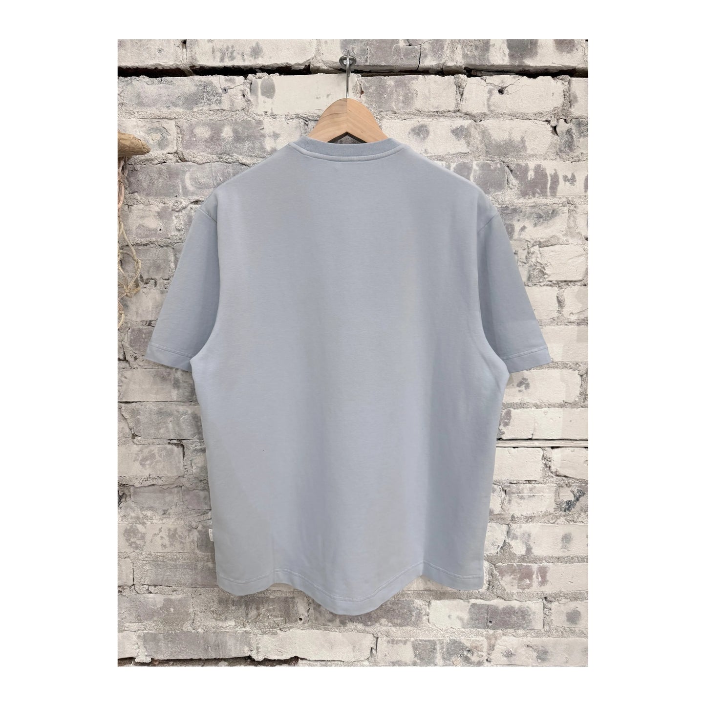 Men's sky blue IF Tee from 04651/ brand, showing a casual short-sleeve cotton t-shirt with a relaxed fit.