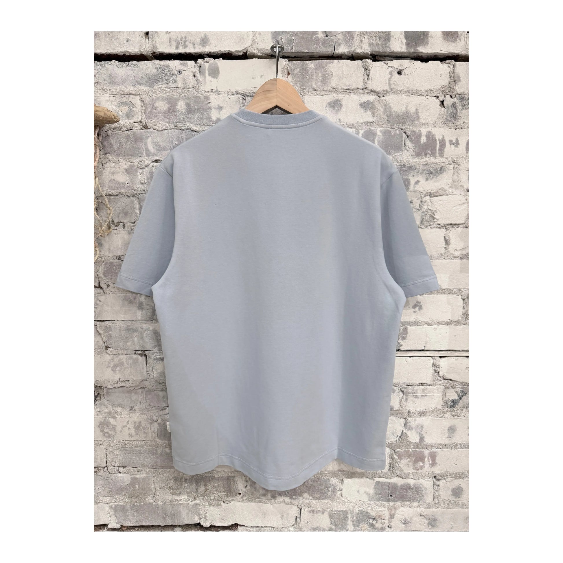 Men's sky blue IF Tee from 04651/ brand, showing a casual short-sleeve cotton t-shirt with a relaxed fit.