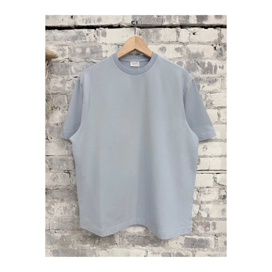 Men's sky blue IF Tee by 04651/ featuring a casual fit and soft fabric, shown on a model with a relaxed style.