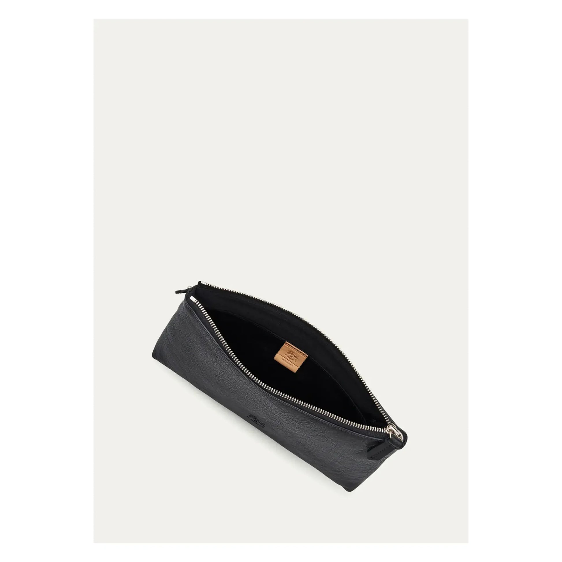 Black women's Il Bisonte Oriuolo clutch with textured leather and minimalist design, featuring a sleek and compact style.