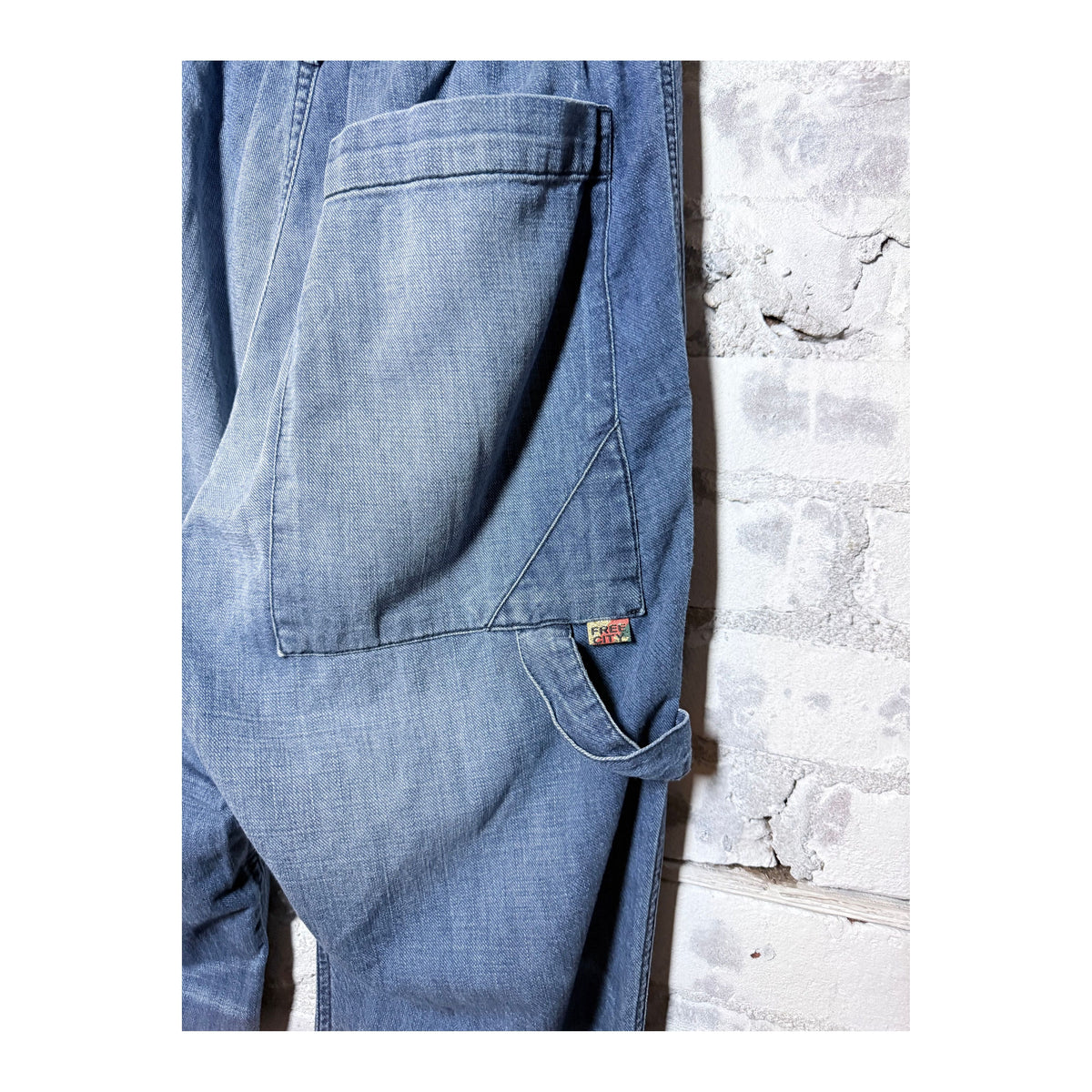 Women's Indigo French Sailors Pants by Freecity, featuring classic navy blue fabric and relaxed fit.