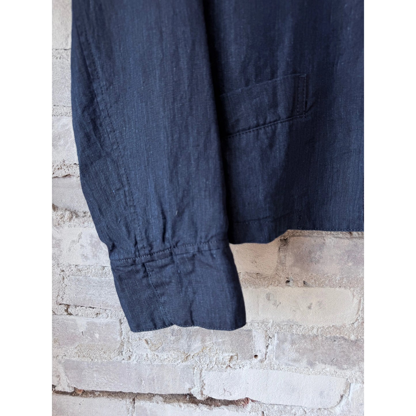 Women’s dark indigo linen chambray jacket by Pas de Calais, featuring a relaxed fit and classic collar detail.