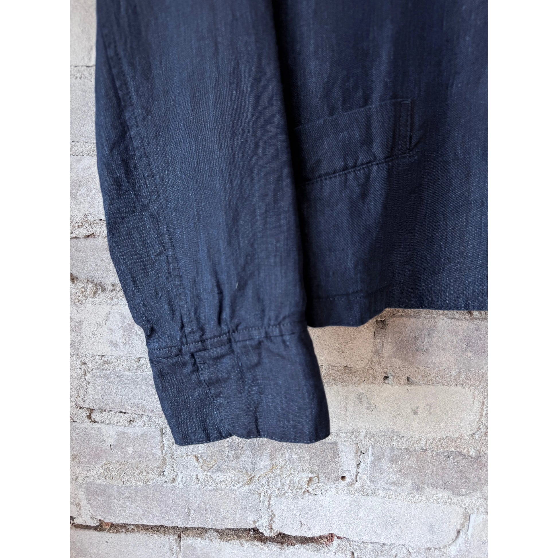 Women’s dark indigo linen chambray jacket by Pas de Calais, featuring a relaxed fit and classic collar detail.