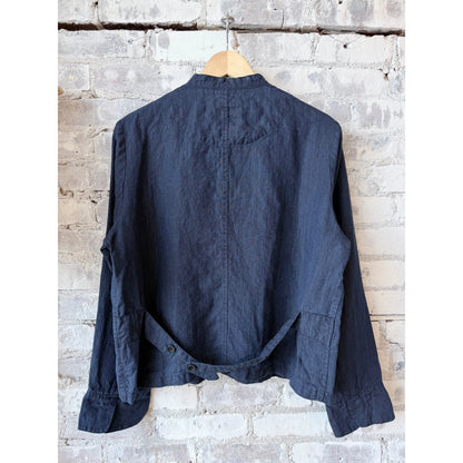 Women's dark indigo linen chambray jacket by Pas de Calais, shown in a relaxed fit with classic collar and button closure.