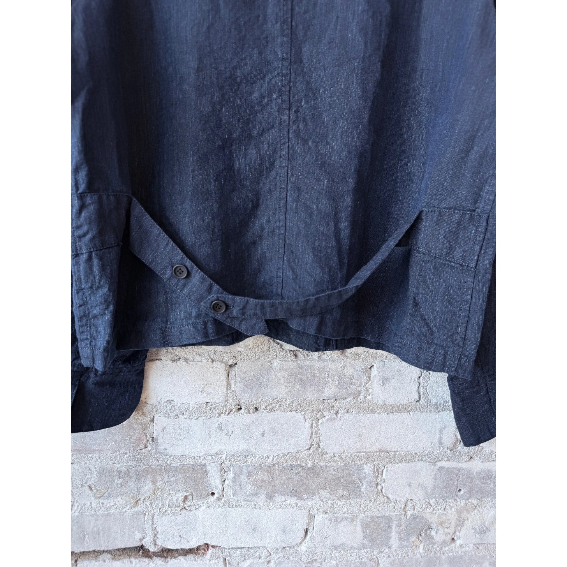 Women's dark indigo linen chambray jacket by Pas de Calais, showcasing a tailored fit and classic collar design.
