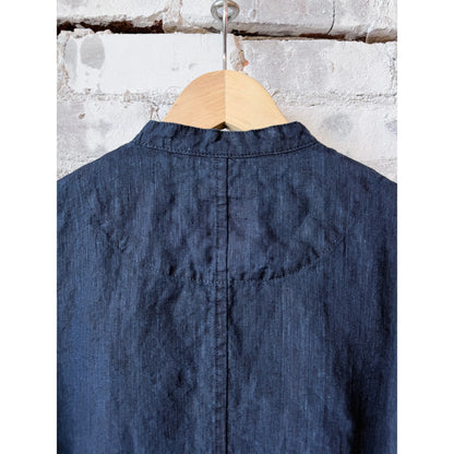 Women's dark indigo linen chambray jacket by Pas de Calais, featuring lightweight fabric and classic tailoring.