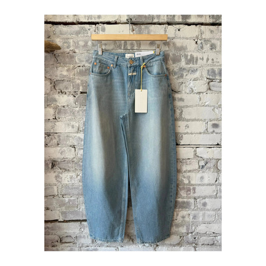 Light blue women's Jazzie Barrel Jeans by Closed Women's displayed on a model, showcasing relaxed fit and stylish denim.