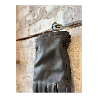 Men's Hestra John Glove in black, stylish leather glove with detailed stitching and comfortable fit for cold weather.