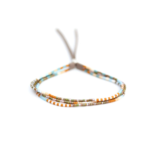 Julie Rofman JR01 Carmel triple strand bracelet with delicate jewelry design and mixed bead textures.