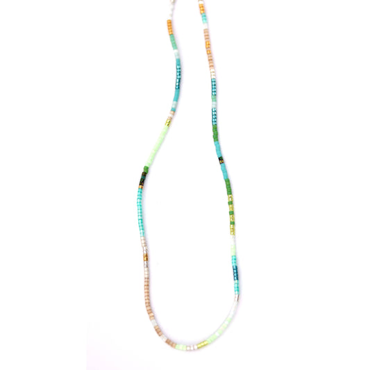 Julie Rofman Aqua Glass Beaded Adjustable Necklace featuring vibrant blue glass beads and a versatile, adjustable jewelry chain.