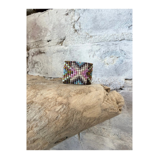 Julie Rofman JRS Komodo beaded shoe loop jewelry with colorful beads and intricate design on a neutral background.