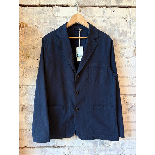 Men's Julian Woven Jacket in navy by Hartford Men's, shown in a close-up image highlighting the textured woven fabric and stylish design.