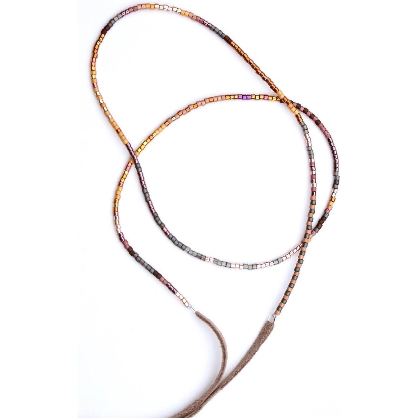 Julie Rofman JRN1 Oro Necklace, elegant gold jewelry with intricate chain design, close-up shot showing fine craftsmanship.