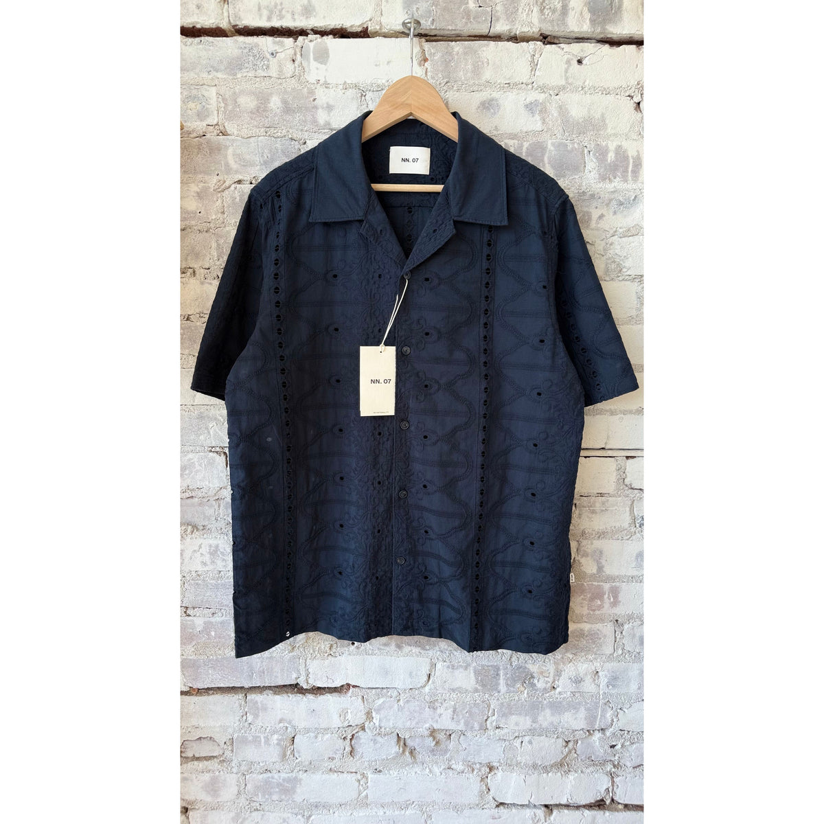 Men's navy blue Julio embroidery shirt by NN07, featuring detailed embroidery and classic fit, shown on a mannequin.