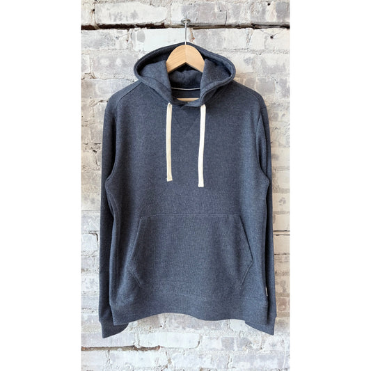 Men's Justin Cashmist Hoodie in Navy Heather by Surfside Supply, showing the soft fabric and relaxed fit on a male model.