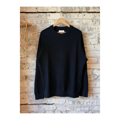 Men's navy Kevin ribbed organic cotton sweater by NN07, featuring a fitted ribbed knit design and classic crew neckline.