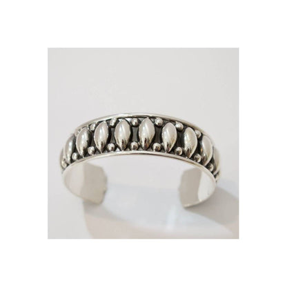 Sterling silver oxidized cuff bracelet from Krystyna's Silver with a textured, vintage-inspired design.