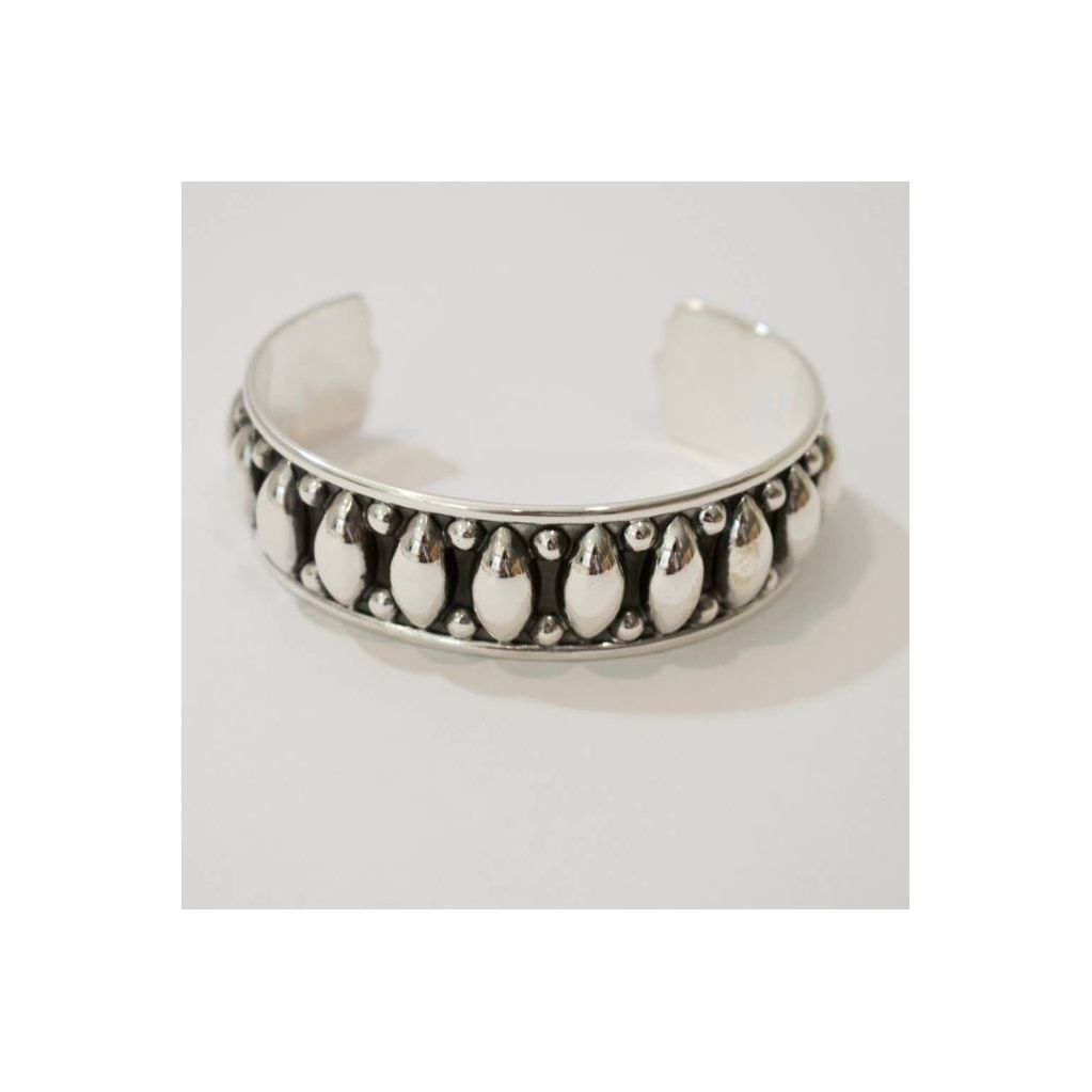 Sterling silver oxidized cuff bracelet from Krystyna's Silver, showcasing a textured western-style accessory with intricate detailing.