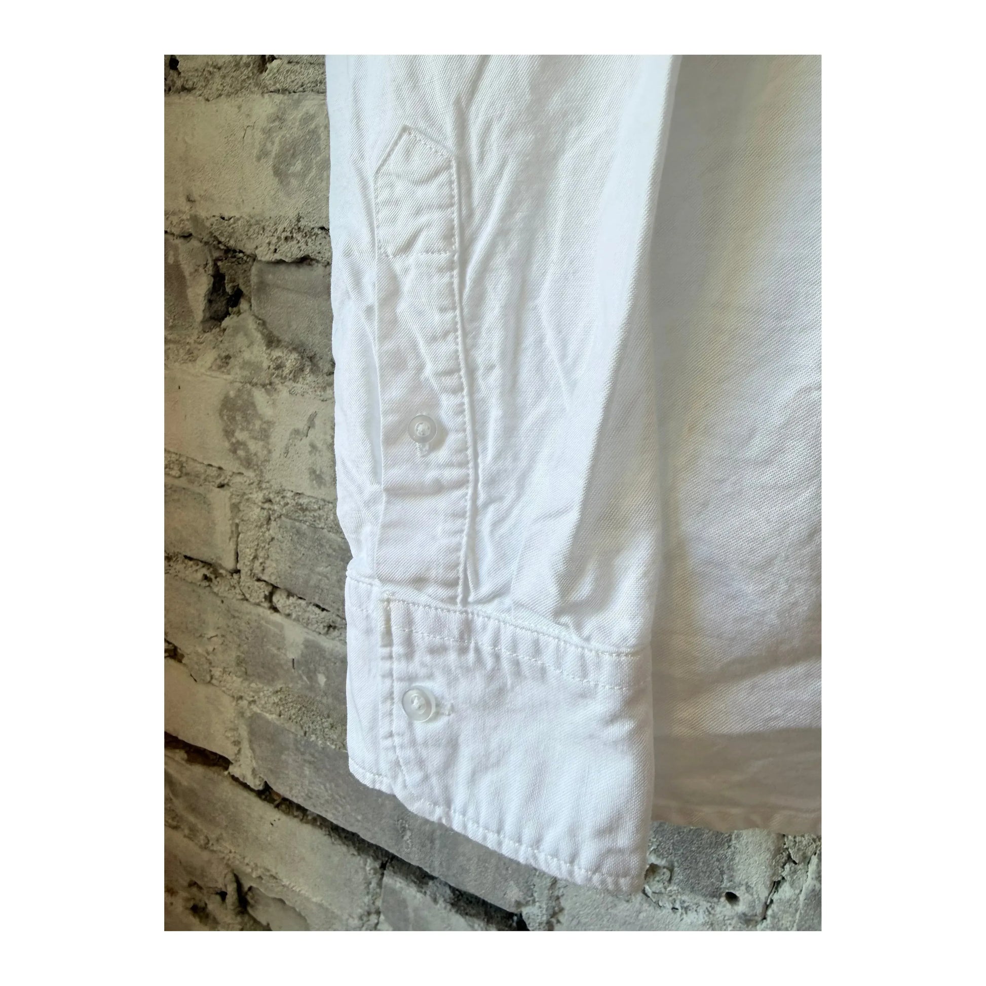 Men's white long-sleeve American Oxford shirt by Save Khaki United, showing the classic collar and button-front design.