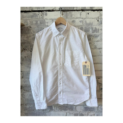 Men's long sleeve white American Oxford shirt by Save Khaki United, shown on a hanger with button-down collar and crisp fabric.