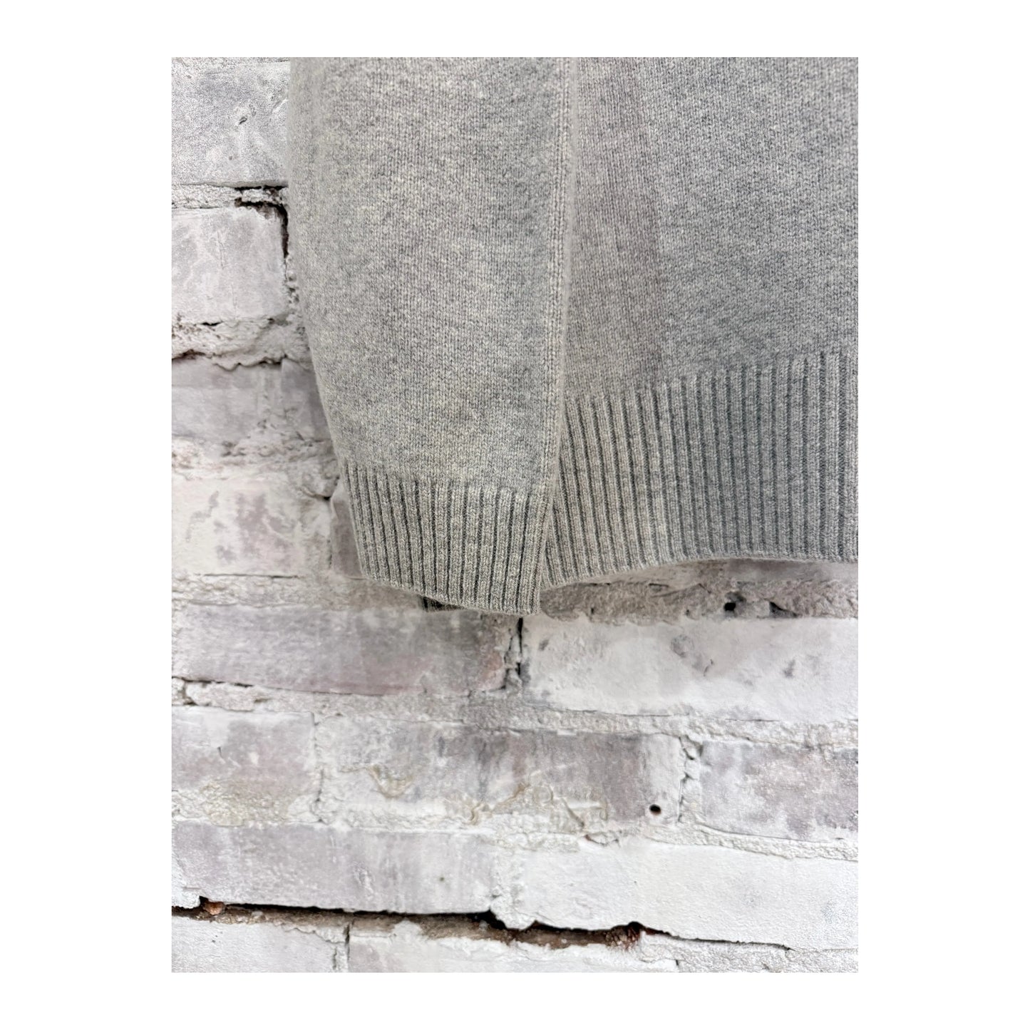 Women's Heather Grey V::Room long sleeve merino jersey knit crew shirt, soft and comfortable fabric, close-up of the textured material.