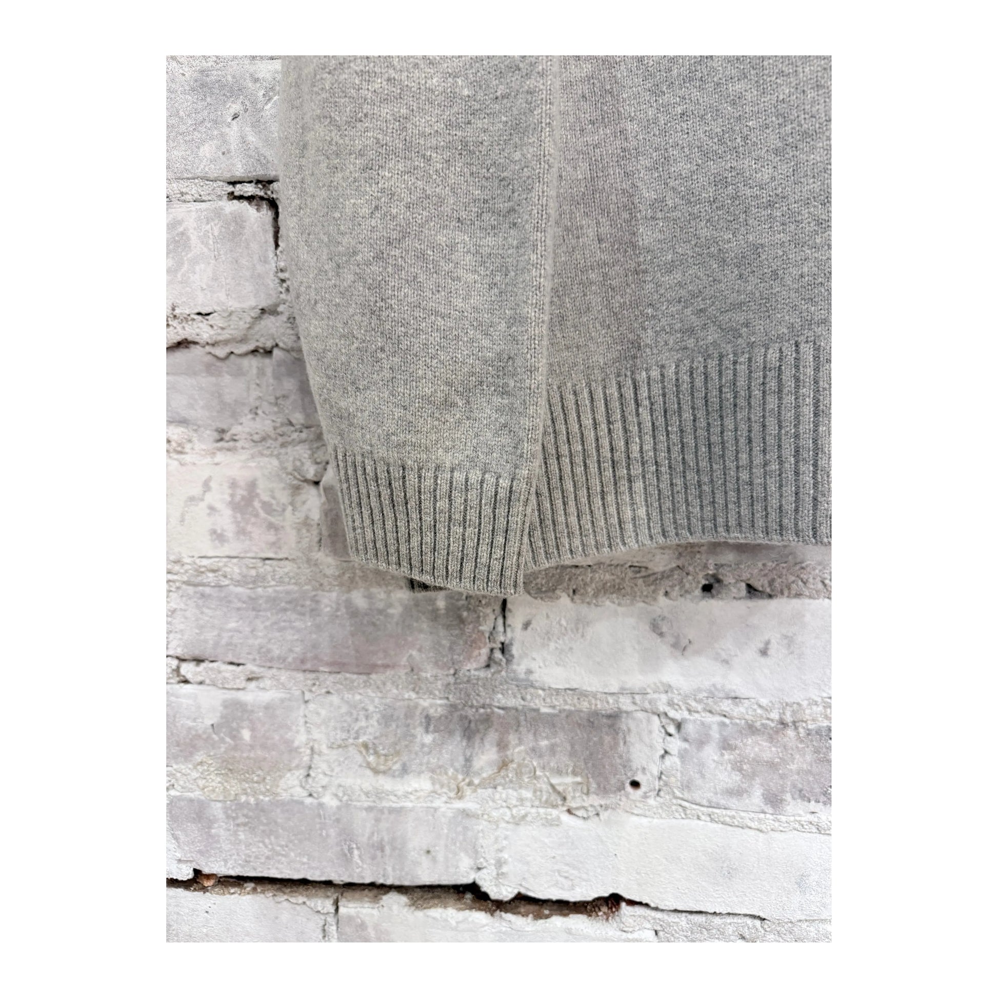 Women's Heather Grey V::Room long sleeve merino jersey knit crew shirt, soft and comfortable fabric, close-up of the textured material.