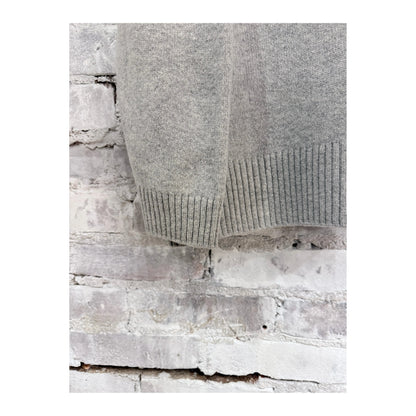 Women's Heather Grey V::Room long sleeve merino jersey knit crew shirt, soft and comfortable fabric, close-up of the textured material.