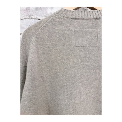 Women's Heather Grey V::Room long sleeve Merino Jersey Knit Crew shirt, soft and comfortable fabric, close-up of the knit texture.