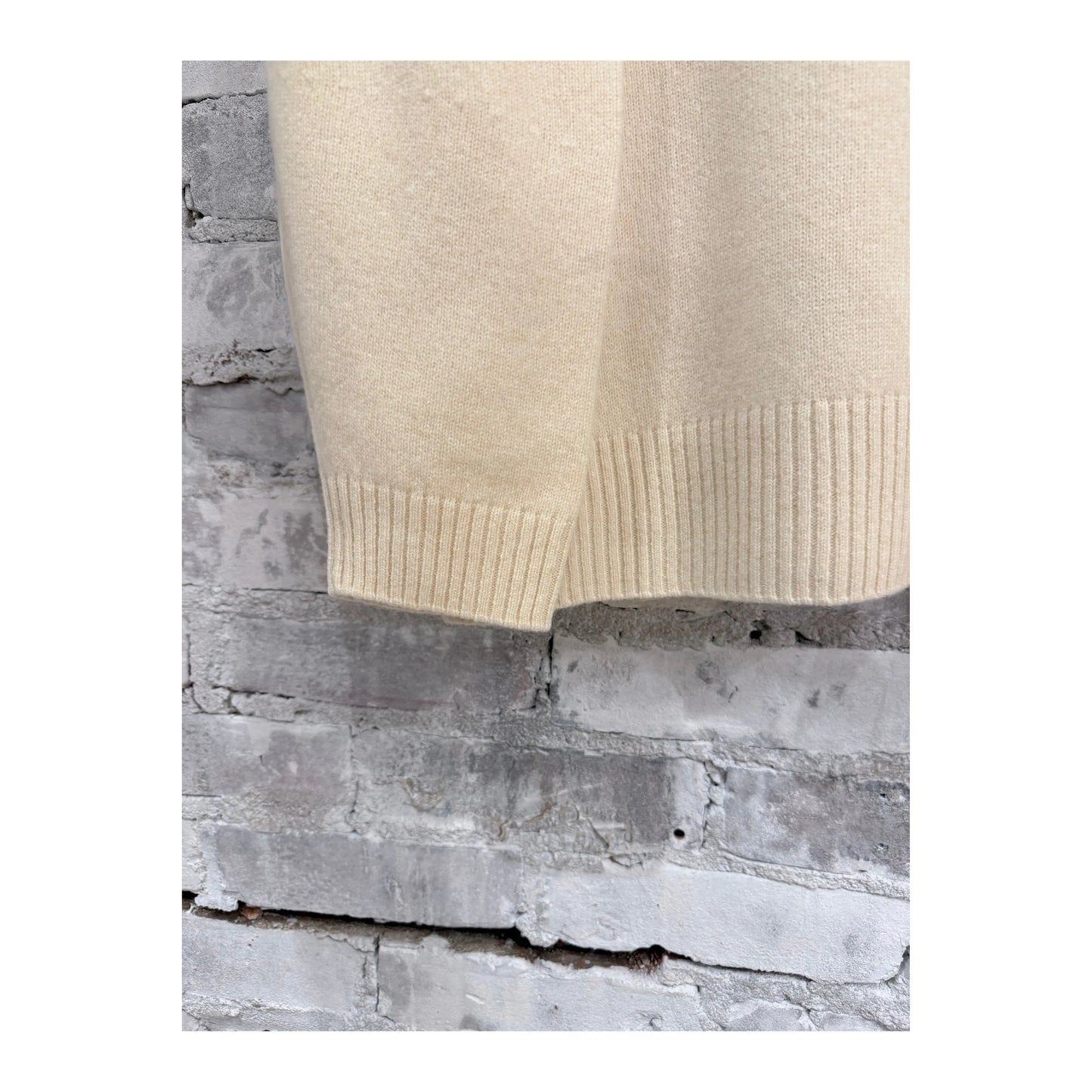 Women's V::Room long-sleeve merino jersey knit crew in natural color, shown on a model with a close-up of the textured fabric.