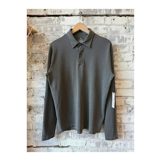 Men's long-sleeve organic recycled polo shirt in black by Save Khaki United, featuring a classic fit and button collar.