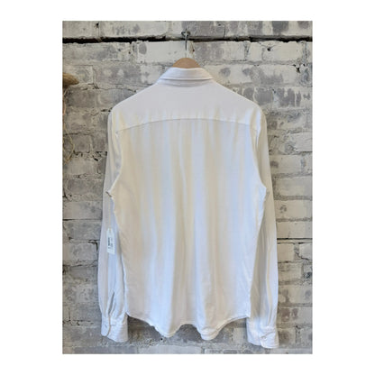Men's white long-sleeve Supima jersey Easy Shirt by Save Khaki United, displayed flat showing collar and button details.