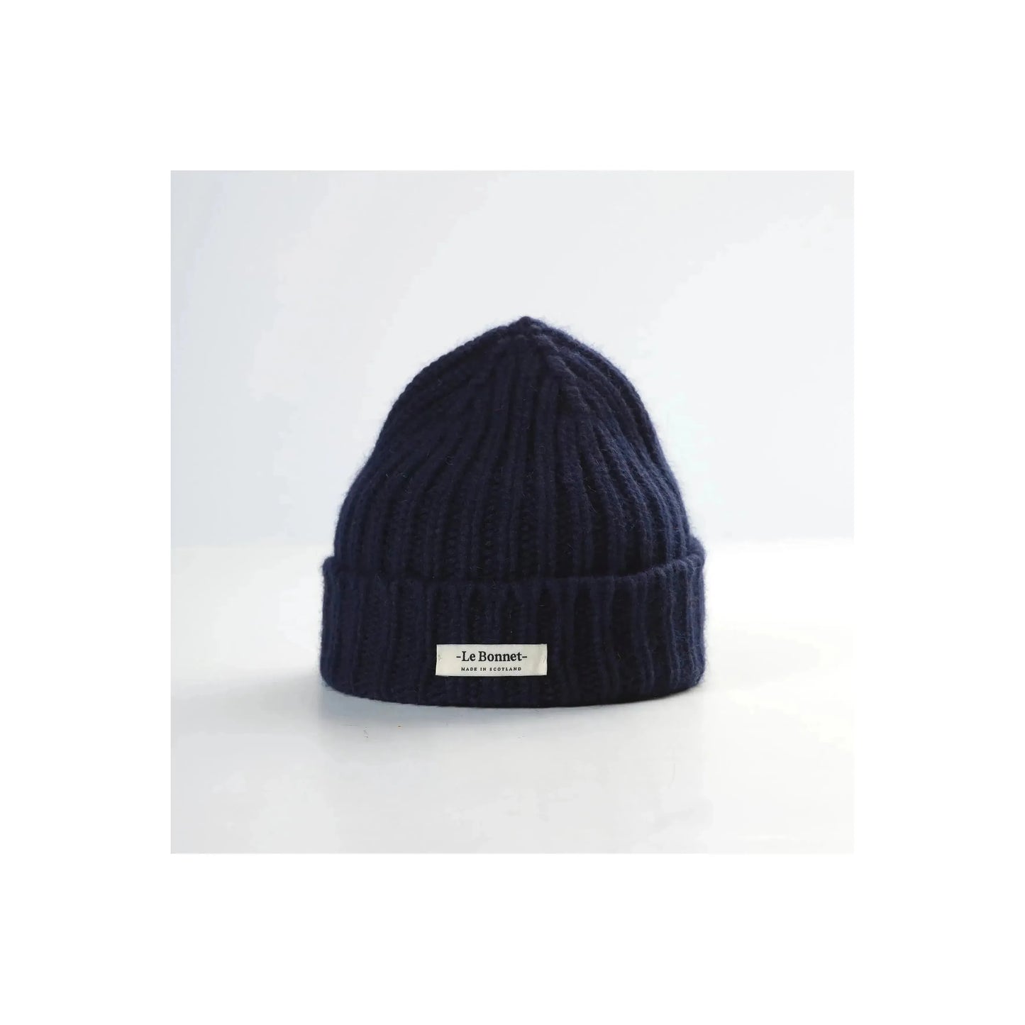 Women's Le Bonnett Logo Beanie in midnight, soft knit fabric with branded embroidery, stylish winter headwear.