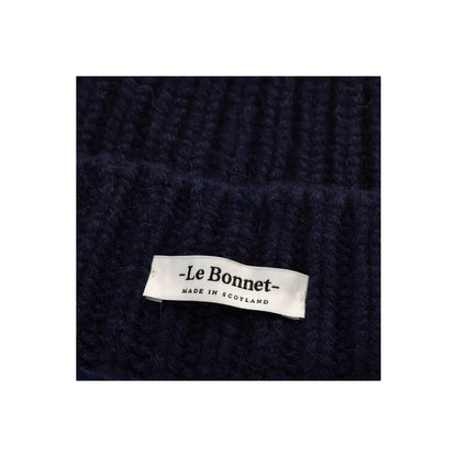 Women's Le Bonnett Logo Beanie in midnight color, close-up of soft knit fabric and embroidered logo detailing.