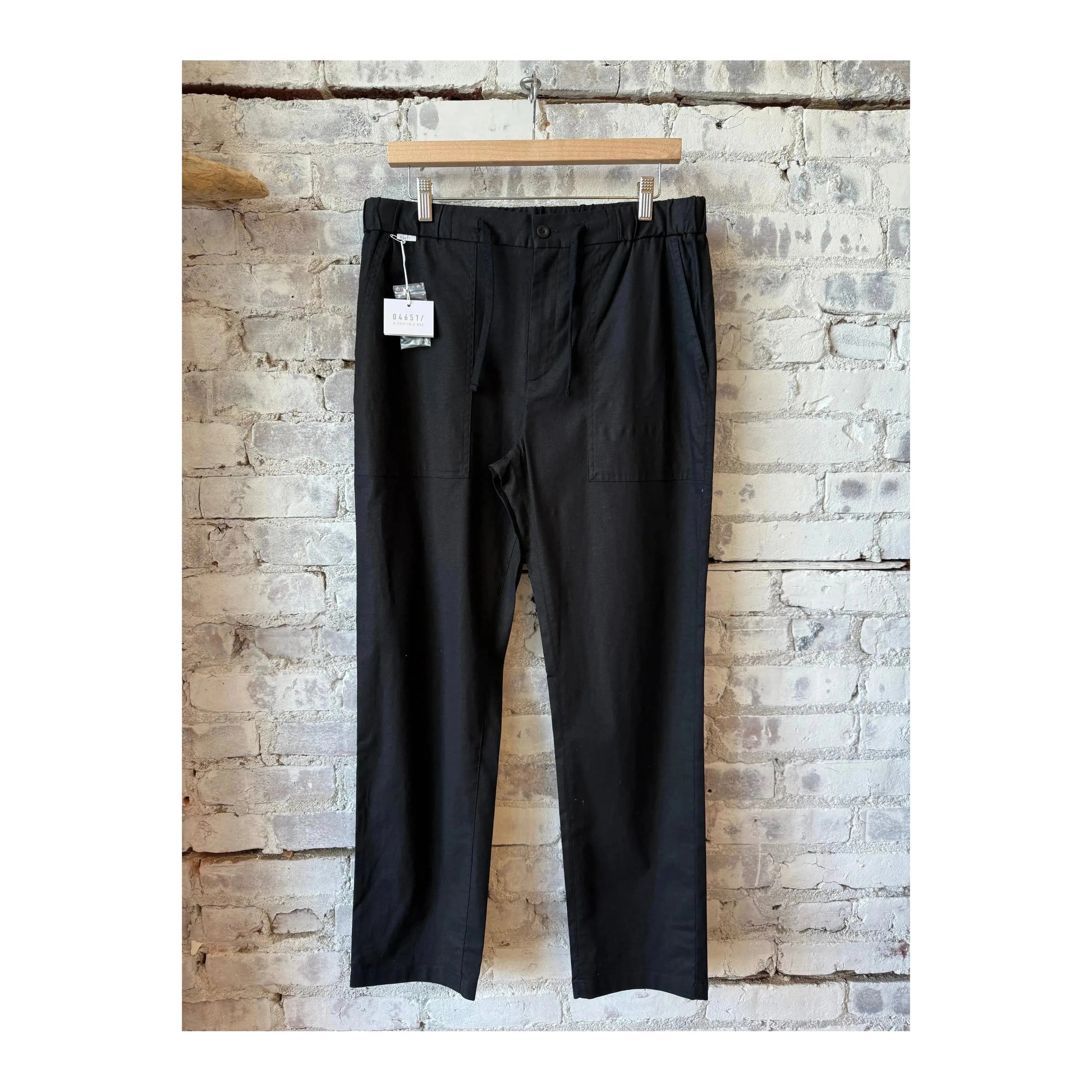 Men's black Lico Workwear pant with practical design and sturdy fabric, suitable for work or casual wear.